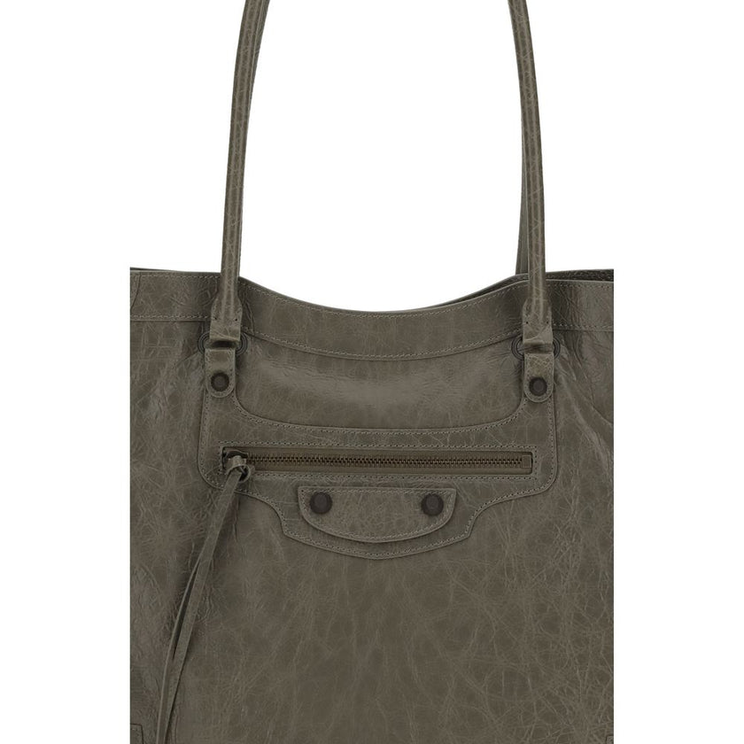 Green Lamb Ovis Aries Aries Shoulder BagThe Le City Tote Bag by Balenciaga is crafted from soft Arena lambskin leather with a vintage finish, offering a spacious and structured silhouette. Designed with two top handles (drop: 23.8 cm), it’s ideal for shou