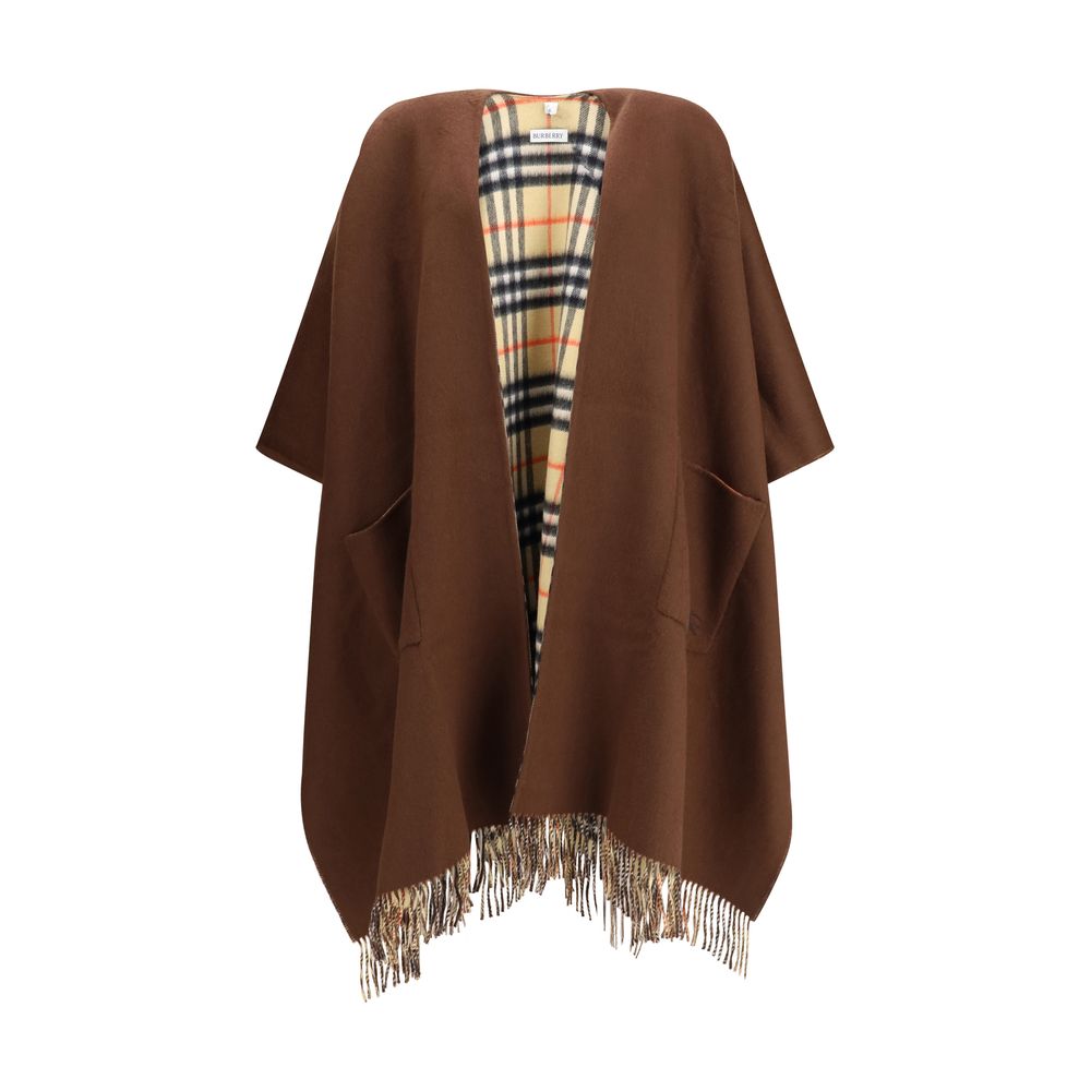 Brown Cashmere CoatThe double-face wool and cashmere cape, reversible with Burberry Check pattern and Equestrian Knight embroidery, with bangs and side pockets. Season: AW25 Fit: Oversize Composition: 48% Kashmir/capra Hircus 52% Wool MADE IN GREAT BRITAI