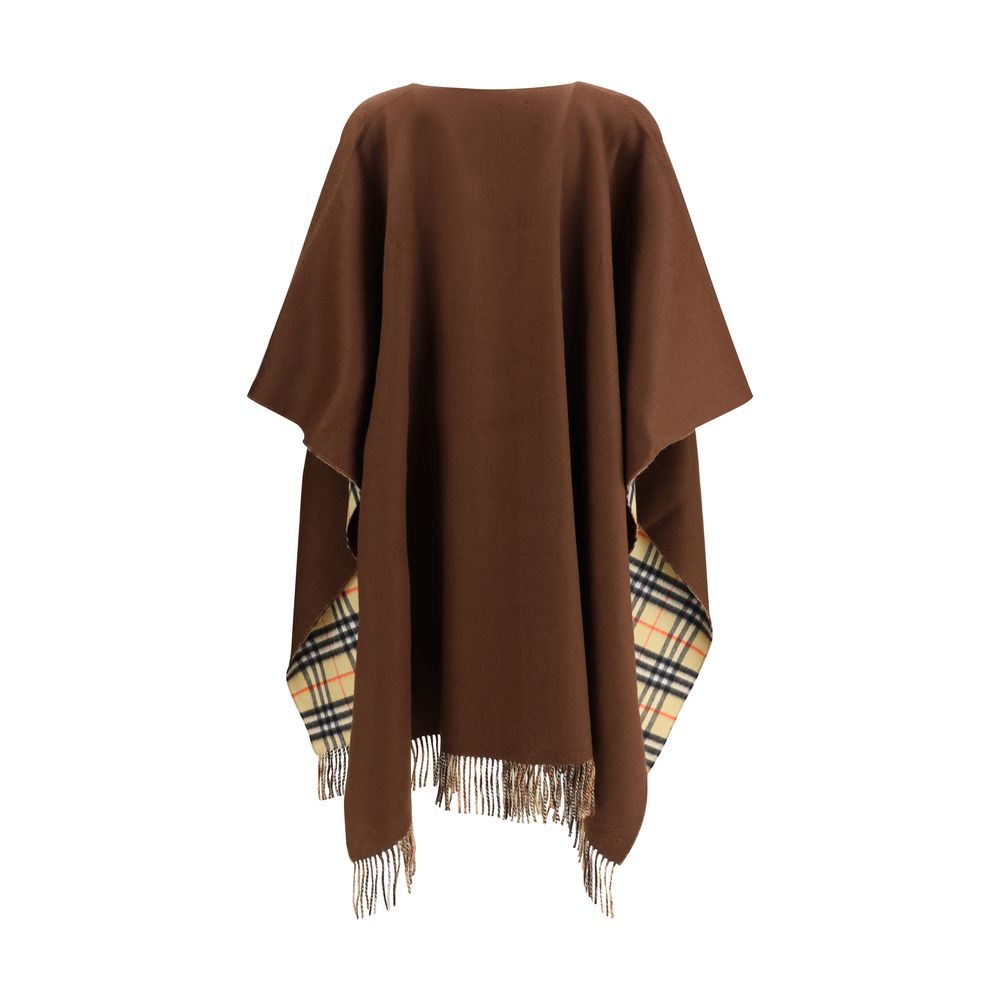 Brown Cashmere CoatThe double-face wool and cashmere cape, reversible with Burberry Check pattern and Equestrian Knight embroidery, with bangs and side pockets. Season: AW25 Fit: Oversize Composition: 48% Kashmir/capra Hircus 52% Wool MADE IN GREAT BRITAI