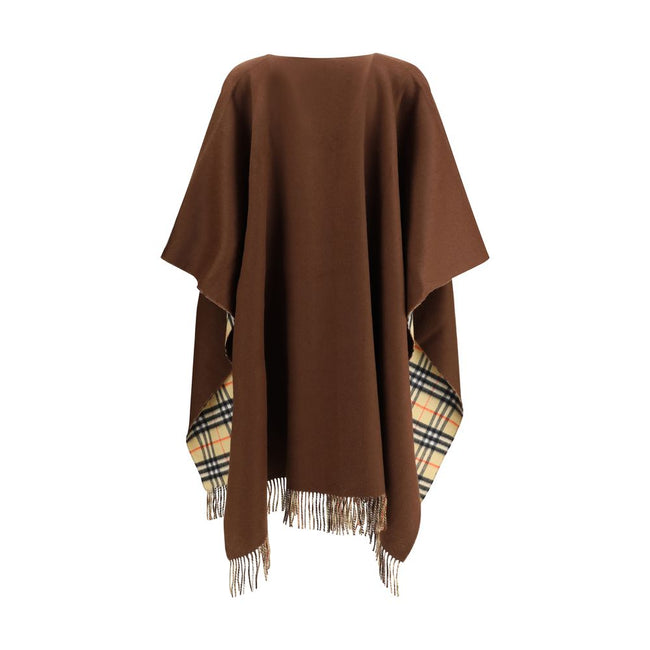 Brown Cashmere CoatThe double-face wool and cashmere cape, reversible with Burberry Check pattern and Equestrian Knight embroidery, with bangs and side pockets. Season: AW25 Fit: Oversize Composition: 48% Kashmir/capra Hircus 52% Wool MADE IN GREAT BRITAI