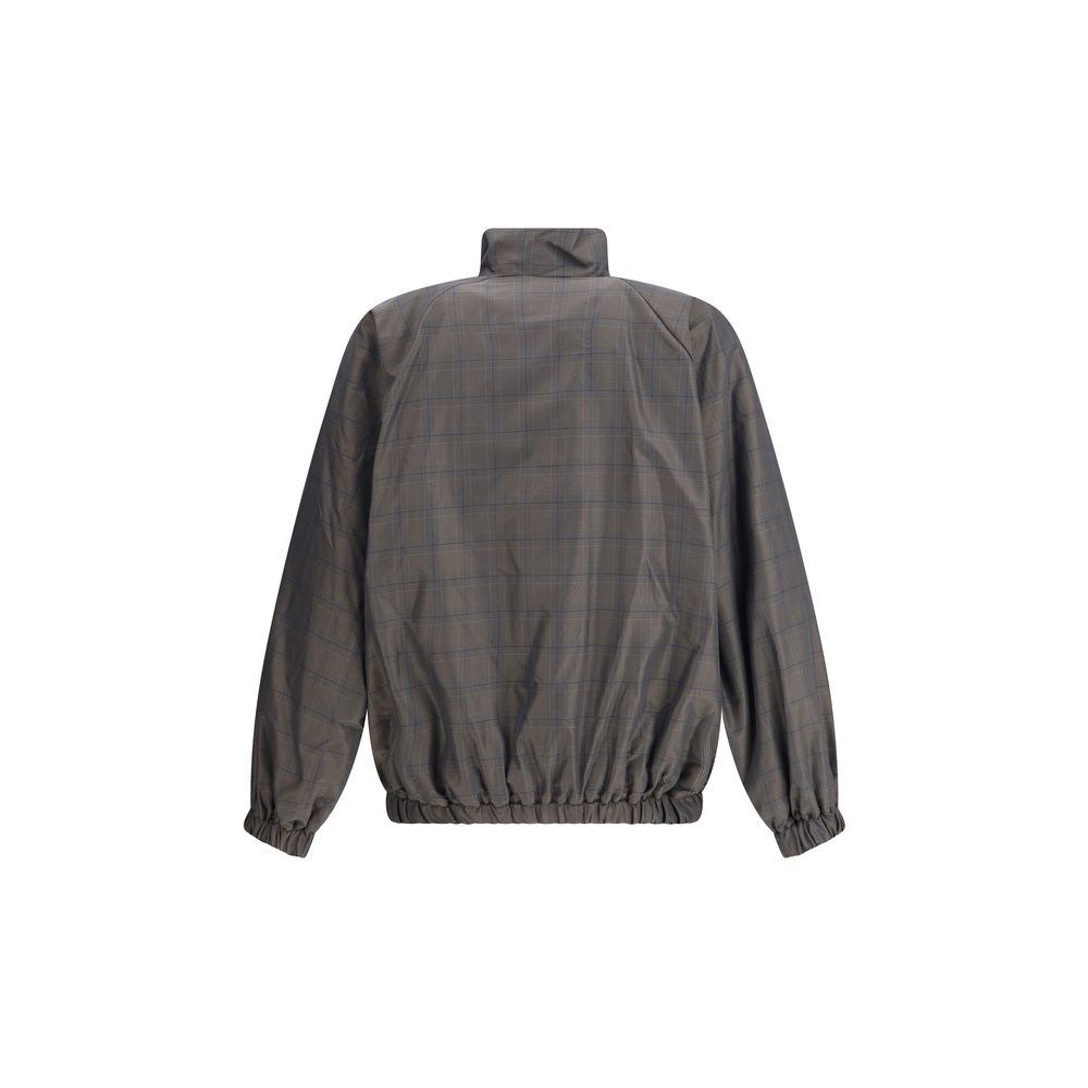Brown Cotton Shell JacketThis Balenciaga Jacket is crafted from checked Cotton and Linen, featuring a high collar and a double-slider zip closure. With long sleeves, two slash pockets, and a drawstring waist, it is finished with embroidered Balenciaga log