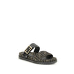 FF fabric sandalThe FF fabric Sandal by Fendi is a flat slide featuring a double strap with a decorative FF Baguette buckle. Crafted in jacquard fabric with the iconic FF pattern and black nappa leather details, it is finished with gold-tone metal hardwar