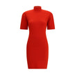 Red Merino Wool Casual DressThe Jaquemus knit dress features structured shoulders, a high neckline, and short sleeves. With a fitted design, it combines elegance with contemporary character, perfect for a bold and refined look Season: AW25 Fit: Slim Compo