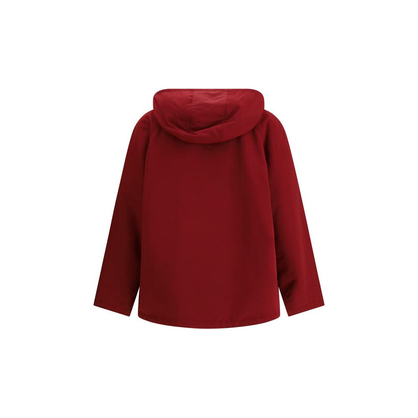 Bordeaux Polyester Shell JacketThe Gucci Red Polyester faille Jacket combines functionality with contemporary style. Featuring a fixed hood with zip and drawcord, four front pockets, adjustable elastic hem, and padding, it provides comfort and protection.