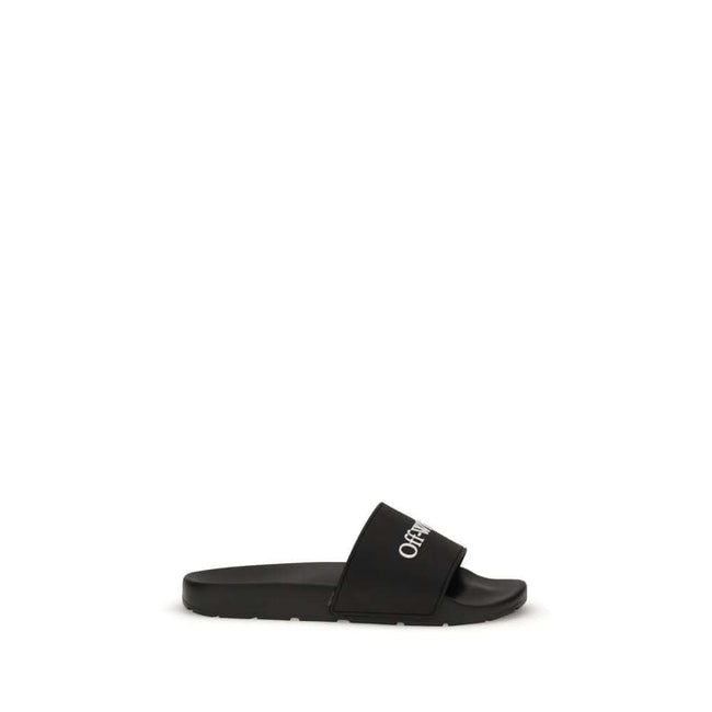 Black Polyethylene SandalsThe Slides by Off-White are a casual and distinctive accessory, designed for an urban and contemporary style. They feature a minimalist silhouette with a wide, comfortable strap, highlighted by the contrasting white Off-White log