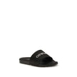 Black Polyethylene SandalsThe Slides by Off-White are a casual and distinctive accessory, designed for an urban and contemporary style. They feature a minimalist silhouette with a wide, comfortable strap, highlighted by the contrasting white Off-White log