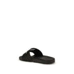 Black Polyethylene SandalsThe Slides by Off-White are a casual and distinctive accessory, designed for an urban and contemporary style. They feature a minimalist silhouette with a wide, comfortable strap, highlighted by the contrasting white Off-White log