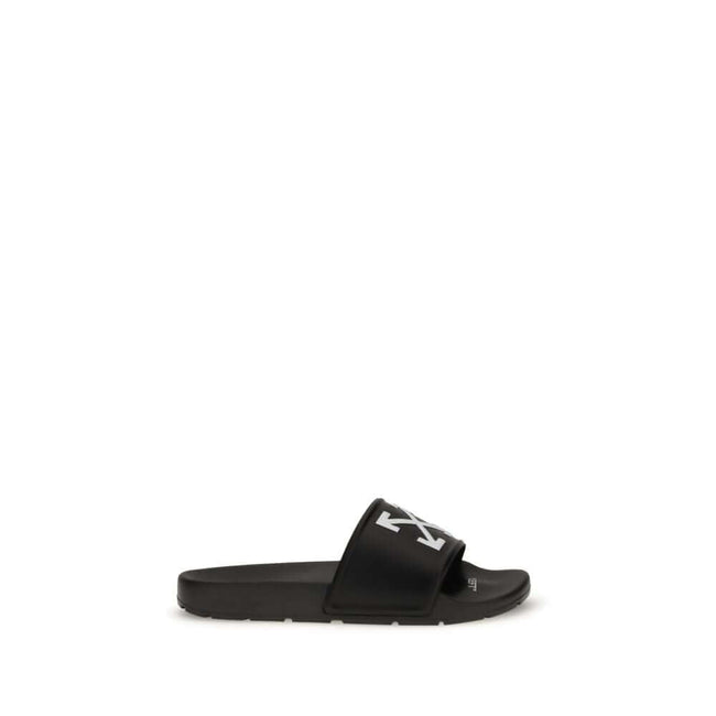 Black Polyethylene SandalsThe Arrow Slides by Off-White are a casual and distinctive accessory, designed for an urban and contemporary style. They feature a clean silhouette with a wide, comfortable strap, highlighted by the brand’s contrasting white embl