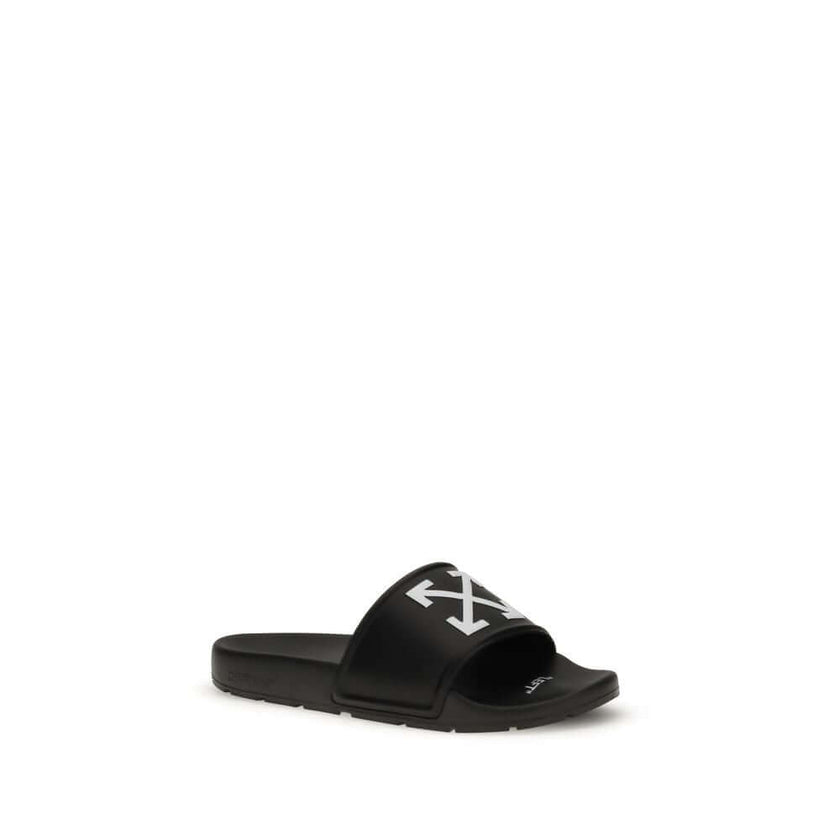 Black Polyethylene SandalsThe Arrow Slides by Off-White are a casual and distinctive accessory, designed for an urban and contemporary style. They feature a clean silhouette with a wide, comfortable strap, highlighted by the brand’s contrasting white embl