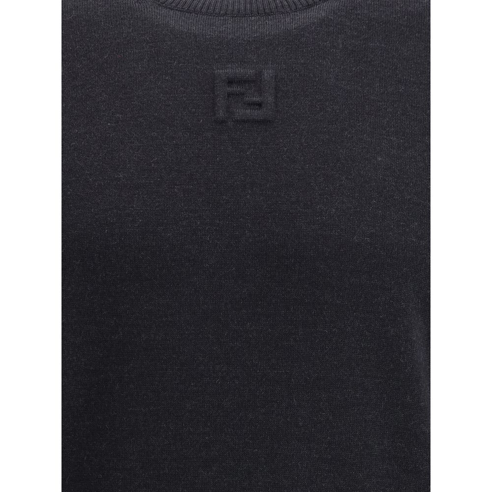Wool SweaterFendi’s Wool Sweater is a classic and refined piece, crafted with ribbed detailing on the crew neck, hem and cuffs for a comfortable and curated fit. The brand’s iconic logo, stitched tone-on-tone on the front, adds an understated touch of ele