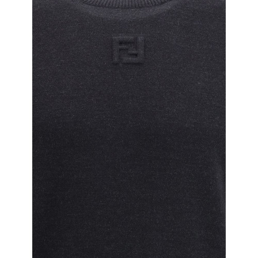 Wool SweaterFendi’s Wool Sweater is a classic and refined piece, crafted with ribbed detailing on the crew neck, hem and cuffs for a comfortable and curated fit. The brand’s iconic logo, stitched tone-on-tone on the front, adds an understated touch of ele