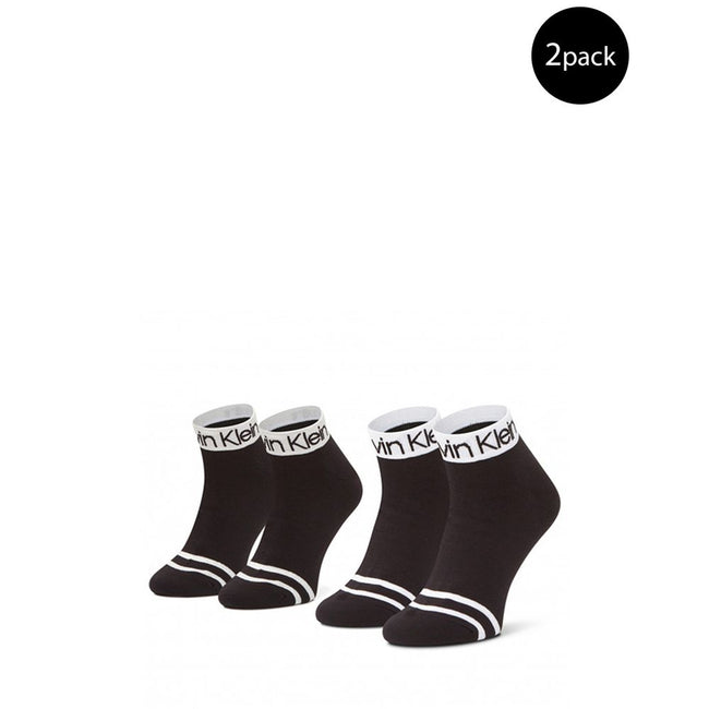 Black Cotton SockExperience the comfort and timeless style of Calvin Klein QUARTER 2P LOGO women’s socks. This convenient 2-pack combines quality with iconic design: the Calvin Klein logo stands out on the elastic band, adding a distinctive touch to any o