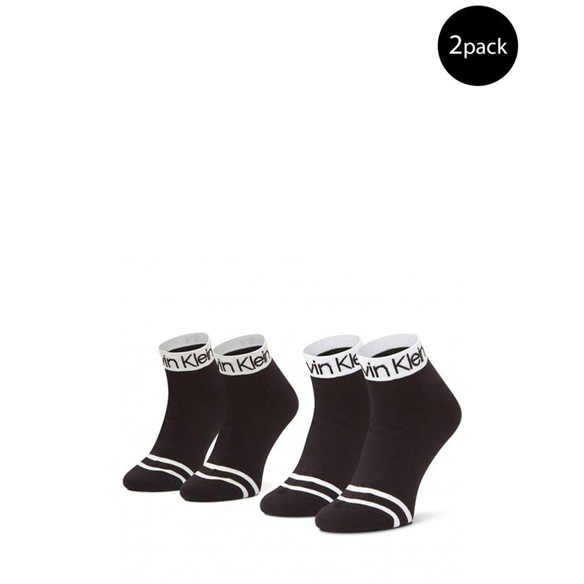 Black Cotton SockExperience the comfort and timeless style of Calvin Klein QUARTER 2P LOGO women’s socks. This convenient 2-pack combines quality with iconic design: the Calvin Klein logo stands out on the elastic band, adding a distinctive touch to any o