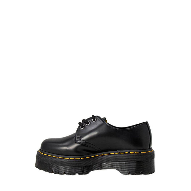Black Leather Lace-Up BootsThe Dr. Martens 1461 QUAD 25567001 women’s lace-up shoes are a must-have for those seeking style and comfort. Made from 100% high-quality leather, these shoes offer exceptional durability and an iconic look. The classic design i