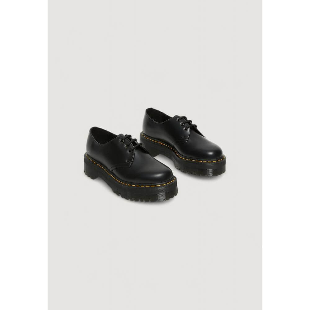 Black Leather Lace-Up BootsThe Dr. Martens 1461 QUAD 25567001 women’s lace-up shoes are a must-have for those seeking style and comfort. Made from 100% high-quality leather, these shoes offer exceptional durability and an iconic look. The classic design i