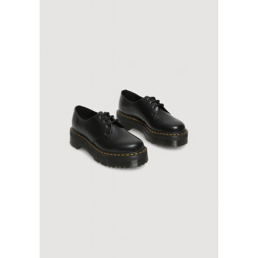 Black Leather Lace-Up BootsThe Dr. Martens 1461 QUAD 25567001 women’s lace-up shoes are a must-have for those seeking style and comfort. Made from 100% high-quality leather, these shoes offer exceptional durability and an iconic look. The classic design i