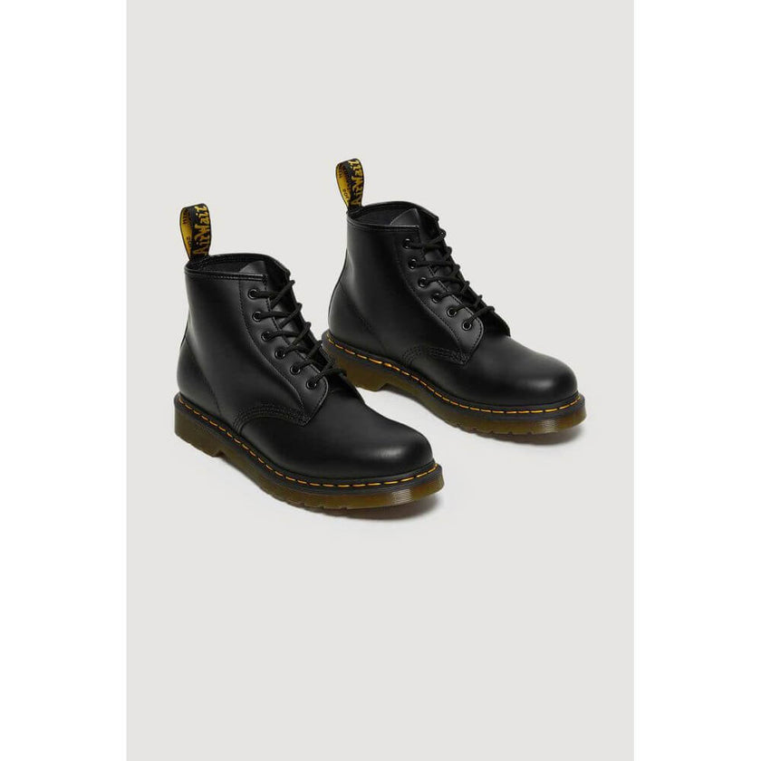 Black Leather Athletic SneakersDiscover the Dr. Martens 101 YS 26230001 men’s boots, made from 100% high-quality leather. These iconic boots offer the perfect balance of style and comfort, making them ideal for any occasion, from everyday wear to more cas