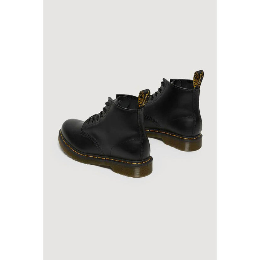 Black Leather Athletic SneakersDiscover the Dr. Martens 101 YS 26230001 men’s boots, made from 100% high-quality leather. These iconic boots offer the perfect balance of style and comfort, making them ideal for any occasion, from everyday wear to more cas