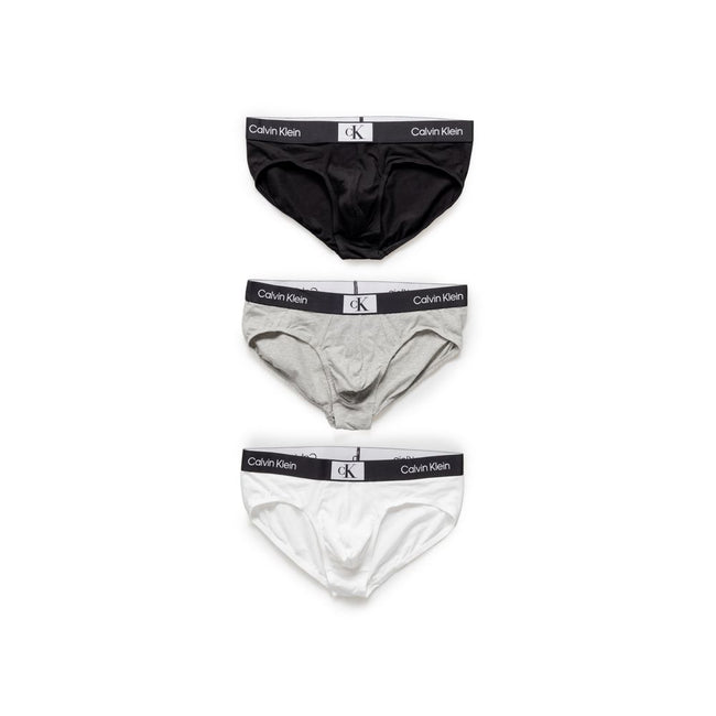 White Cotton BriefsExperience timeless comfort and style with the Calvin Klein Underwear HIP BRIEF men’s briefs, available in a convenient 3-pack. Made from 100% high-quality cotton, these briefs provide a perfect fit and a soft feel against the skin. The