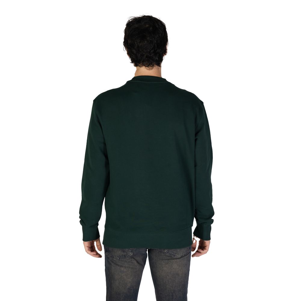 Green Cotton SweatshirtThe Boss JERSEY WE BASIC CREW 50487133 men’s crew neck sweatshirt is an essential piece with a modern and minimalist design. Made from 100% high-quality cotton, it offers a soft and comfortable feel against the skin. The contrasting
