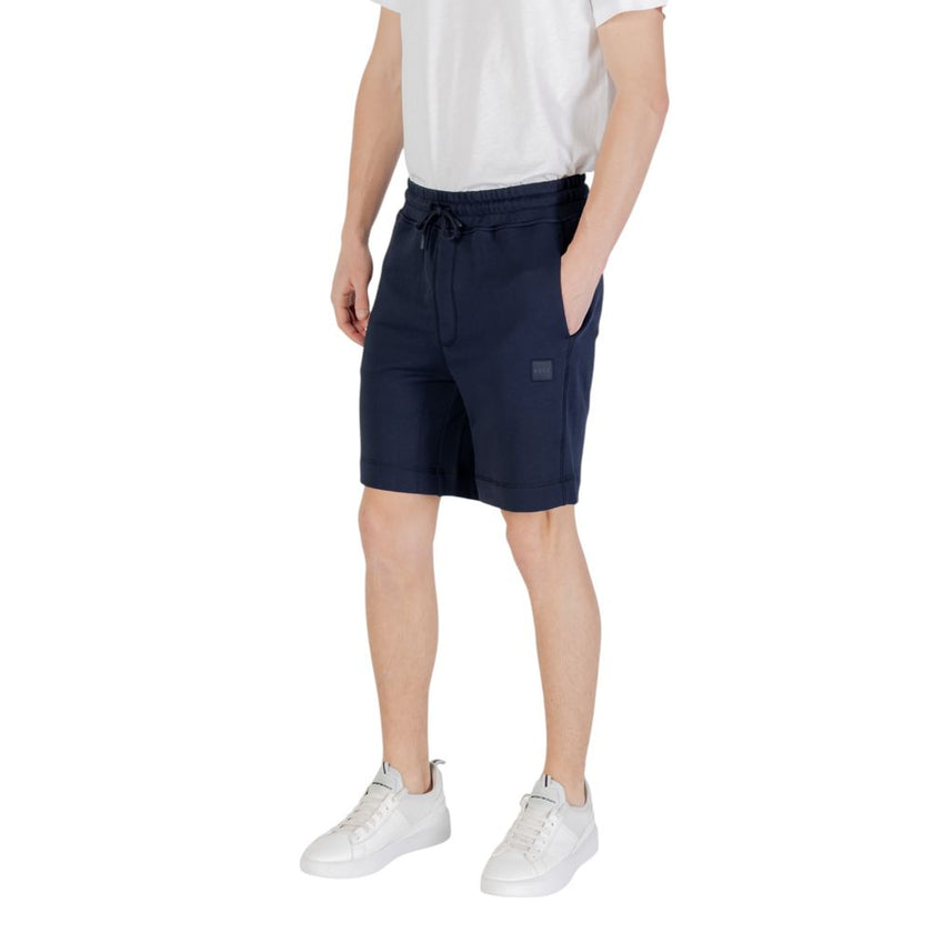 Blue Cotton Bermuda ShortsThe Boss Sewalk 10234591 02 50511726 men’s bermuda shorts are crafted from 100% cotton, ensuring exceptional comfort and breathability, perfect for warm seasons. Featuring a regular fit, these shorts come with an elastic waistban