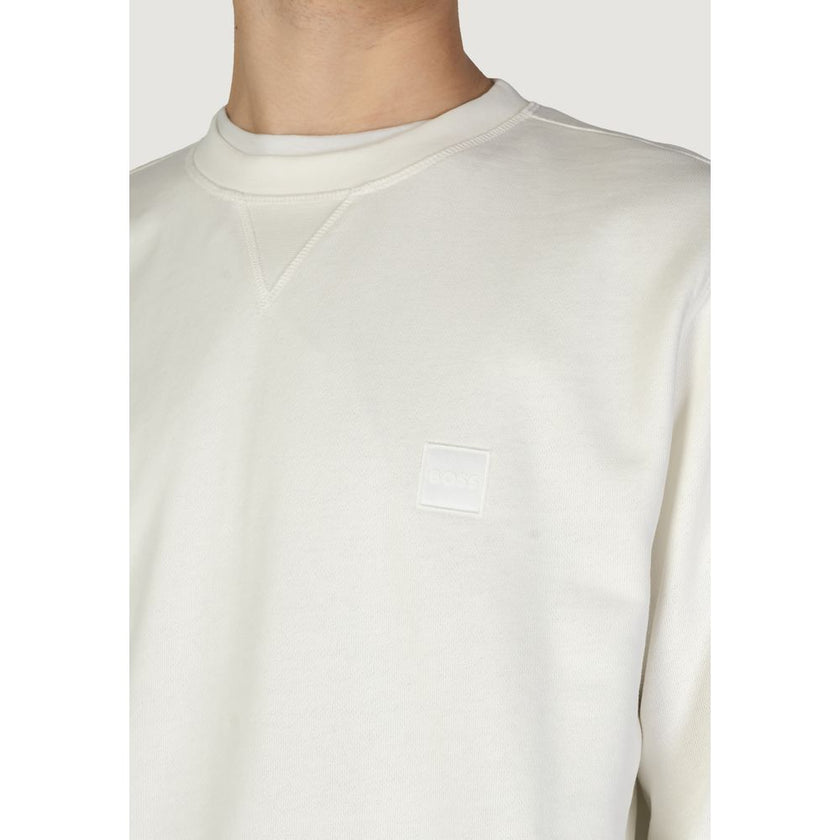 White Cotton SweatshirtThe Boss Westart 10234591 02 men’s crew neck sweatshirt (model 50509323) is a must-have and versatile piece for the modern man’s wardrobe. Made from 100% pure cotton, it ensures softness and comfort, as well as breathability and dur