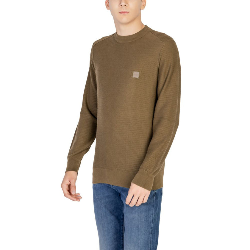 Green Cotton SweaterThe Boss Anion_S 10265864 01 50527584 men’s sweater is a refined knitwear piece, perfect for those seeking both style and comfort. Crafted from a premium blend of 95% cotton and 5% cashmere, it provides exceptional softness and a comfo