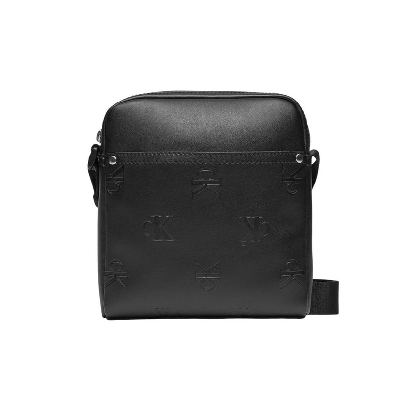 Black Polyethylene Messenger BagThe Calvin Klein Jeans AOP REPORTER K50K512564 men’s crossbody bag is the perfect accessory for those seeking style and functionality. Made from 100% polyurethane, this bag is durable and easy to clean, making it ideal for