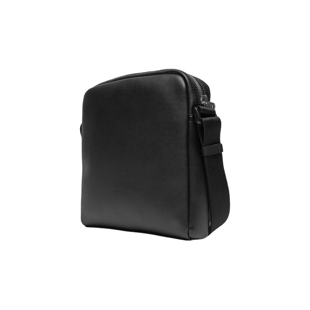 Black Polyethylene Messenger BagThe Calvin Klein Jeans AOP REPORTER K50K512564 men’s crossbody bag is the perfect accessory for those seeking style and functionality. Made from 100% polyurethane, this bag is durable and easy to clean, making it ideal for