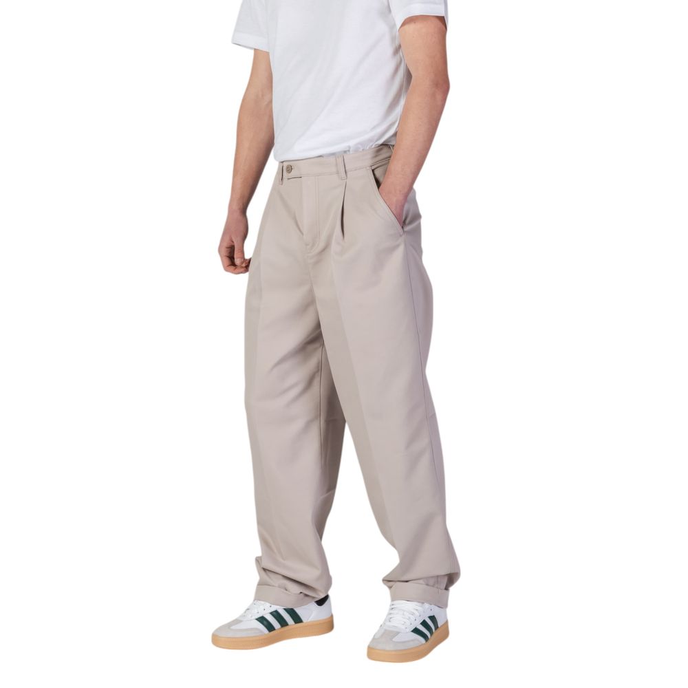 Beige Recycled Polyester Casual PantsThe Calvin Klein Jeans TAILORED J30J326927 men’s trousers feature a regular/comfort fit, perfect for those seeking both style and functionality. Crafted from a blend of 49% recycled polyester, 48% organic cotton, and 3