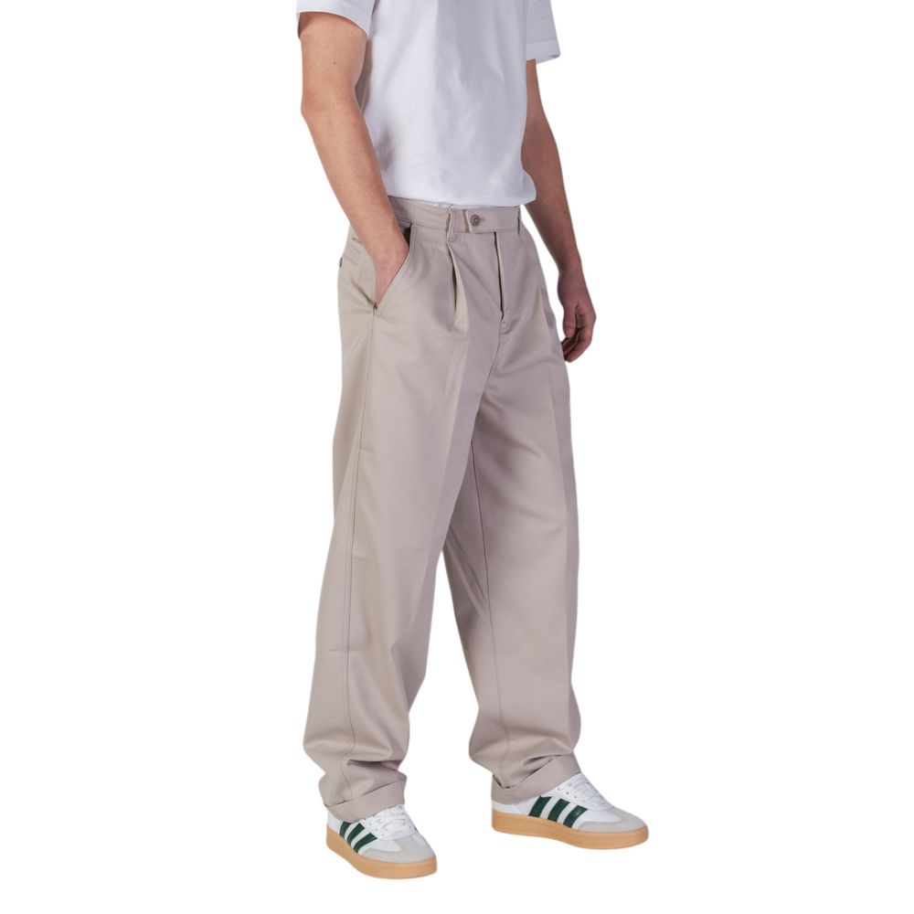 Beige Recycled Polyester Casual PantsThe Calvin Klein Jeans TAILORED J30J326927 men’s trousers feature a regular/comfort fit, perfect for those seeking both style and functionality. Crafted from a blend of 49% recycled polyester, 48% organic cotton, and 3