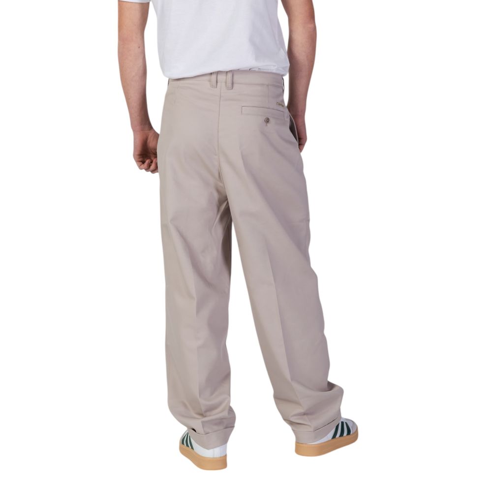 Beige Recycled Polyester Casual PantsThe Calvin Klein Jeans TAILORED J30J326927 men’s trousers feature a regular/comfort fit, perfect for those seeking both style and functionality. Crafted from a blend of 49% recycled polyester, 48% organic cotton, and 3