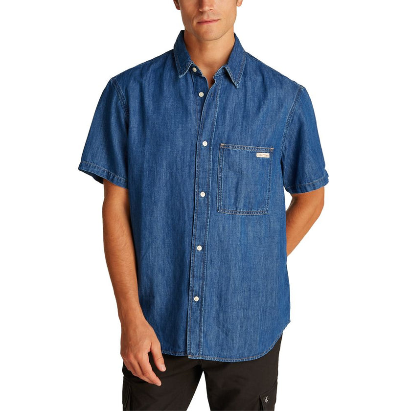 Blue Cotton ShirtDiscover the Calvin Klein Jeans REGULAR SS DENIM J30J327178 long-sleeve shirt for men, a versatile and stylish piece of clothing. Made with an innovative blend of materials, this shirt features 47% cotton, 20% recycled cotton, 19% linen,