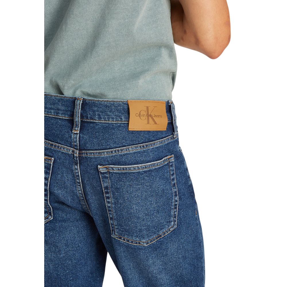 Blue Cotton Bermuda ShortsThe Calvin Klein Jeans J30J327184 men’s bermuda shorts are perfect for those seeking a casual and modern look. Made from a blend of 94% cotton, 4% elastomultiester, and 2% elastane/lycra, these shorts provide a slim fit that hugs
