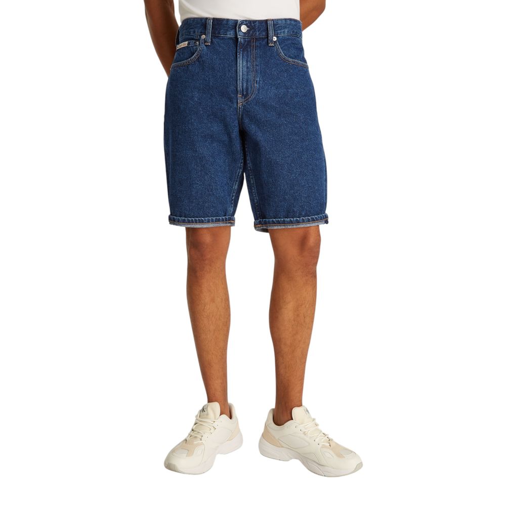 Blue Cotton Bermuda ShortsThe Calvin Klein Jeans REGULAR J30J327192 men’s bermuda shorts are perfect for a casual and stylish look. Made from 100% cotton, they provide a comfortable and breathable fit, ideal for warm summer days. The classic and versatile