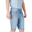 Blue Cotton Bermuda ShortsThe Calvin Klein Jeans REGULAR J30J327513 men’s bermuda shorts embody contemporary casual style. Crafted from 80% cotton and 20% recycled cotton, they ensure comfort, breathability, and a focus on sustainability. The regular fit