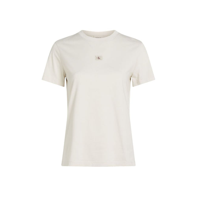 Beige Recycled Cotton T-ShirtDiscover the Calvin Klein Jeans WOVEN LABEL REGULAR short-sleeve t-shirt for women, an essential piece for your wardrobe. Made from 100% recycled cotton, this t-shirt provides a soft and comfortable feel against the skin. The