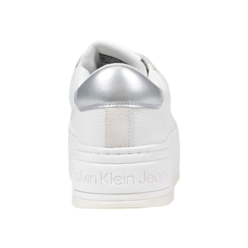 Silver Leather SneakerThe Calvin Klein Jeans BOLD FLATF LOW MIX YW0YW01632 women’s sneakers embody contemporary elegance and modern design. Crafted from 100% premium leather, these sneakers feature a clean silhouette enhanced by metallic details on the he