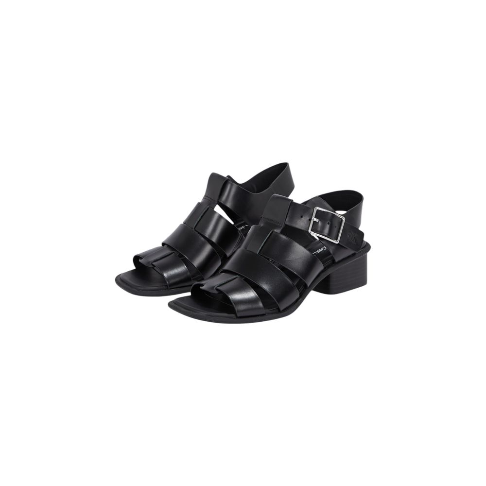 Black Polyester SandalThe Calvin Klein Jeans HEEL SQUARE MG BUCKLE YW0YW01708 women’s sandals offer a perfect blend of modern style and everyday comfort. Crafted from a mix of polyester (60%) and polyurethane (40%), these sandals feature an elegant silhou