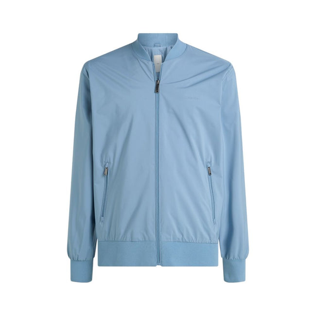 Light Blue Recycled Polyester Jackets & CoatDiscover the Matte Bomber jacket by Calvin Klein, an essential piece for the men’s wardrobe. Made from 100% recycled polyester, this bomber combines sustainability with contemporary style. The minimalist design