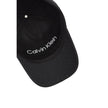 Black Recycled Polyester Cap (Baseball Hat)Discover the women’s visor cap by Calvin Klein, an elegant and practical accessory for any occasion. Made from 100% recycled polyester, this cap not only offers a modern look with its jacquard monogram design but