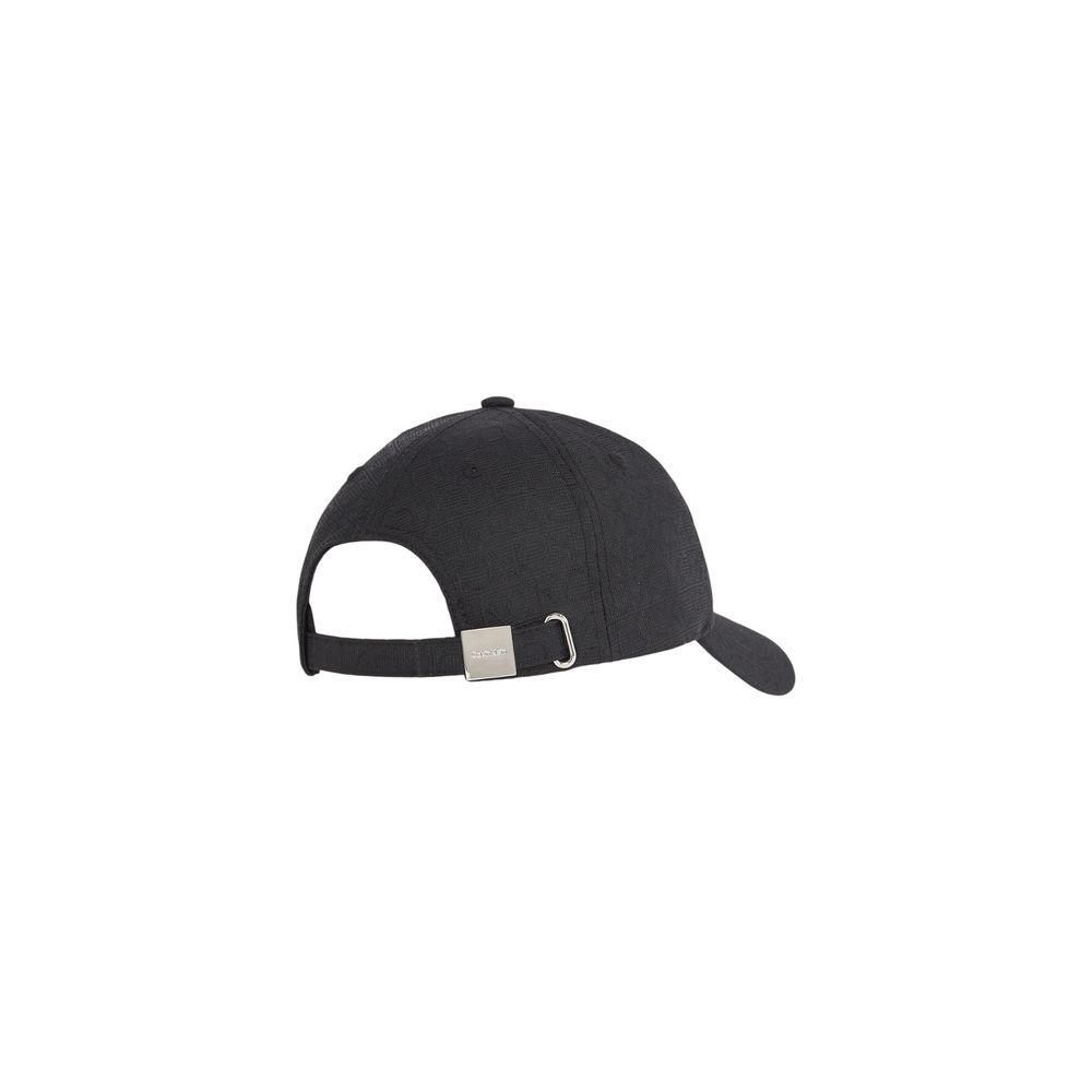 Black Recycled Polyester Cap (Baseball Hat)Discover the women’s visor cap by Calvin Klein, an elegant and practical accessory for any occasion. Made from 100% recycled polyester, this cap not only offers a modern look with its jacquard monogram design but