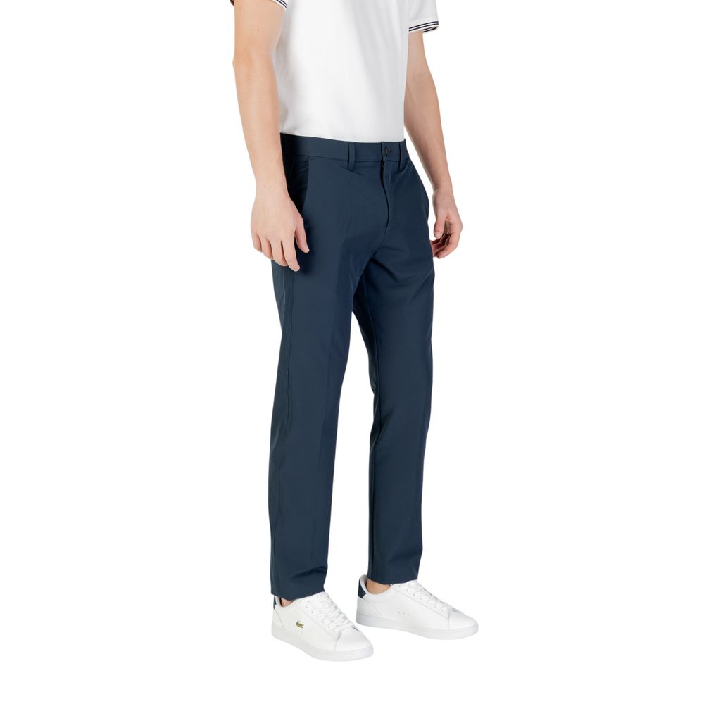 Blue Polyester Skinny PantsThe Boss T_Commuter-Slim men’s slim pants are the perfect choice for those seeking a balance between style and comfort. Made from a blend of 95% polyester and 5% elastane/lycra, these pants offer a tailored fit that perfectly co