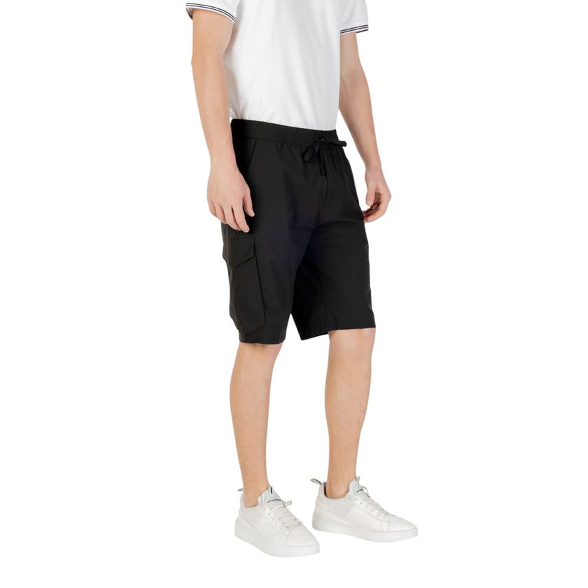 Black Polyester Bermuda ShortsDiscover the Boss S_Urbanex-Cargo men’s bermuda shorts, made from 100% polyester for lightweight comfort. These shorts feature practical side pockets, making them ideal for a casual and functional look. The elastic waistband