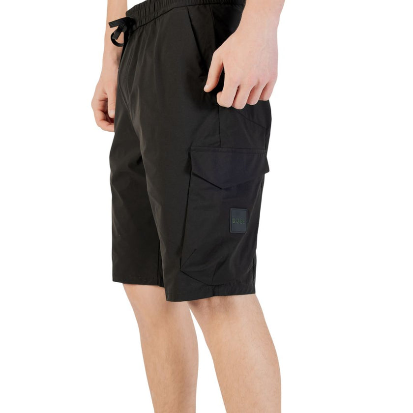 Black Polyester Bermuda ShortsDiscover the Boss S_Urbanex-Cargo men’s bermuda shorts, made from 100% polyester for lightweight comfort. These shorts feature practical side pockets, making them ideal for a casual and functional look. The elastic waistband