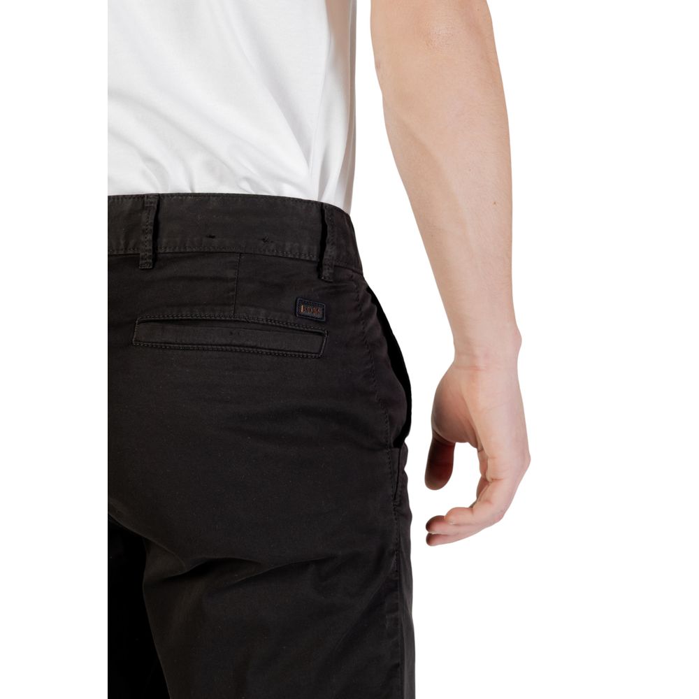 Black Cotton BermudaDiscover the Boss Chino-Slim Shorts, an essential piece for the modern man’s wardrobe. Made from 97% cotton and 3% elastane/lycra, these shorts provide a comfortable fit and great freedom of movement. The slim fit design ensures a cont