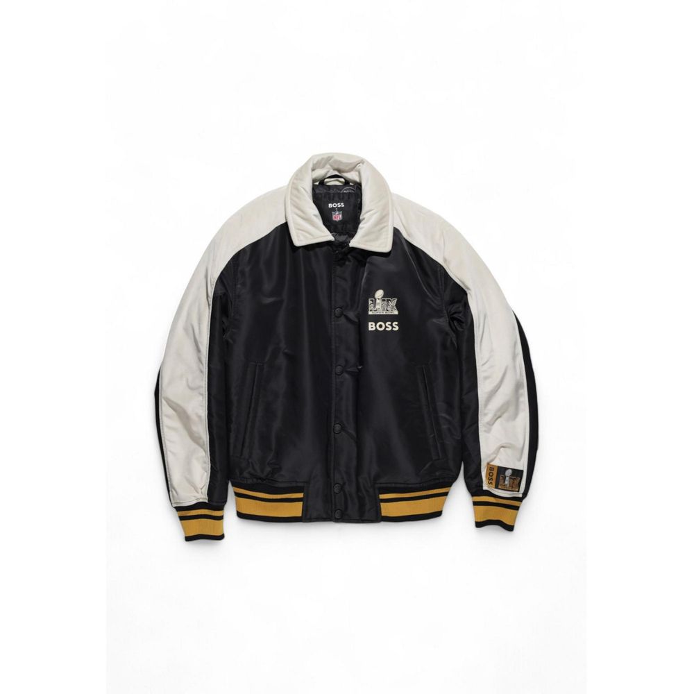 Black Polyamide BomberThe Boss Cutback2_NFL 10254787 01 50535088 men’s jacket combines sporty style with urban sophistication. Made from 100% polyamide, this jacket is lightweight, durable, and comfortable in any situation. Its design stands out thanks to