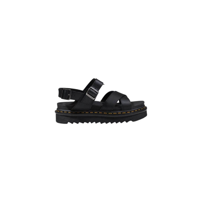 Black Leather SandalThe Dr. Martens Voss II Athena 31558001 women’s sandals are made from 100% high-quality leather, ensuring durability and longevity. This model combines style and comfort, making them perfect for any summer occasion. The rubber sole pro