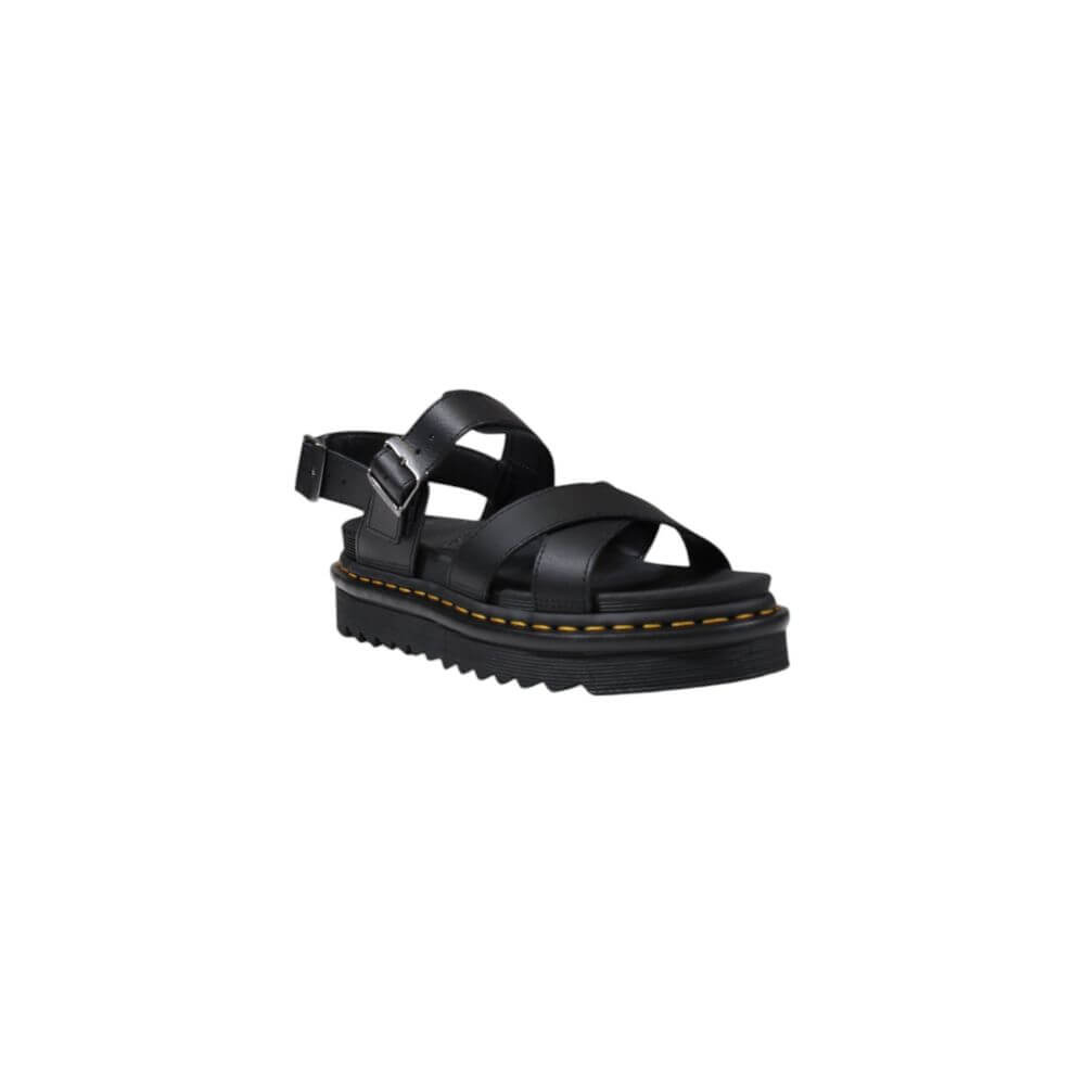 Black Leather SandalThe Dr. Martens Voss II Athena 31558001 women’s sandals are made from 100% high-quality leather, ensuring durability and longevity. This model combines style and comfort, making them perfect for any summer occasion. The rubber sole pro