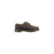Brown Leather Oxfords And DerbiesThe Dr. Martens 3989 Ys Crazy Horse lace-up shoes for men are a perfect blend of style and comfort. Made from 100% high-quality leather, these shoes offer exceptional durability and a refined appearance. The classic design